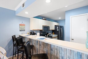 Fridge, microwave, oven, stovetop - Ground Floor Condo Just Across from the Beach (Panama City Beach)