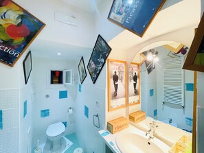 Shower, eco-friendly toiletries, hair dryer, bidet