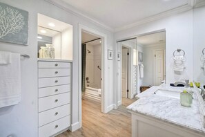 Shower, hair dryer, towels, shampoo