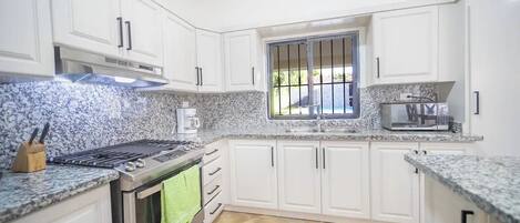 Fridge, microwave, stovetop, cookware/dishes/utensils