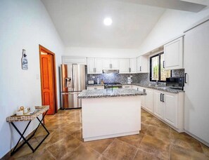 Fridge, microwave, stovetop, cookware/dishes/utensils