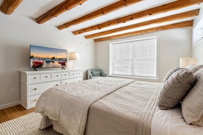 Bedroom 1 with queen bed, Smart TV, and ensuite  - Near Long Sands: 2 Living Areas, Family Fun (York)