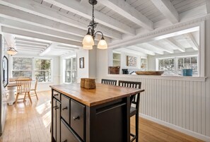Fully equipped kitchen with counter seating 