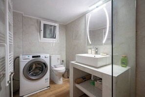 Hair dryer, towels, toilet paper