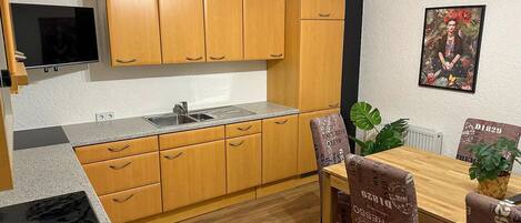 Departamento | Cocina privada | Refrigerador, microondas, horno y lavavajillas