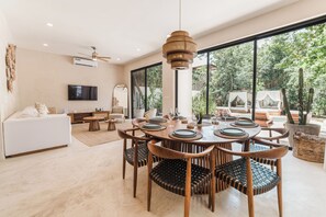 Deluxe Villa, Balcony, Pool View | Living area | Flat-screen TV