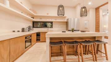 Deluxe Villa, Balcony, Pool View | Private kitchen | Full-size fridge, microwave, oven, stovetop