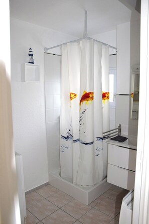 Douche, savon, papier toilette