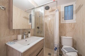 Hair dryer, towels, soap, shampoo