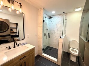 Hair dryer, towels, soap, shampoo