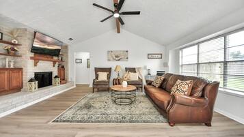 Smart TV, fireplace, books