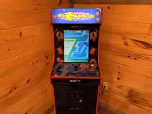Game room - Modern Cabin with Hot Tub, Air Hockey, King Beds, Grill and Outdoor Pool! (Sevierville)
