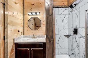 Shower, hair dryer, towels, soap - Modern Cabin with Hot Tub, Air Hockey, King Beds, Grill and Outdoor Pool! (Sevierville)