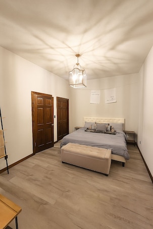 2 bedrooms, desk, bed sheets. Fit and Fueled Studio
