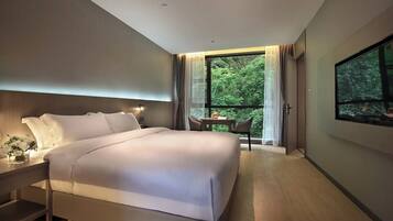 Luxury Suite, Balcony, Hill View | Desk, laptop workspace, WiFi (free)