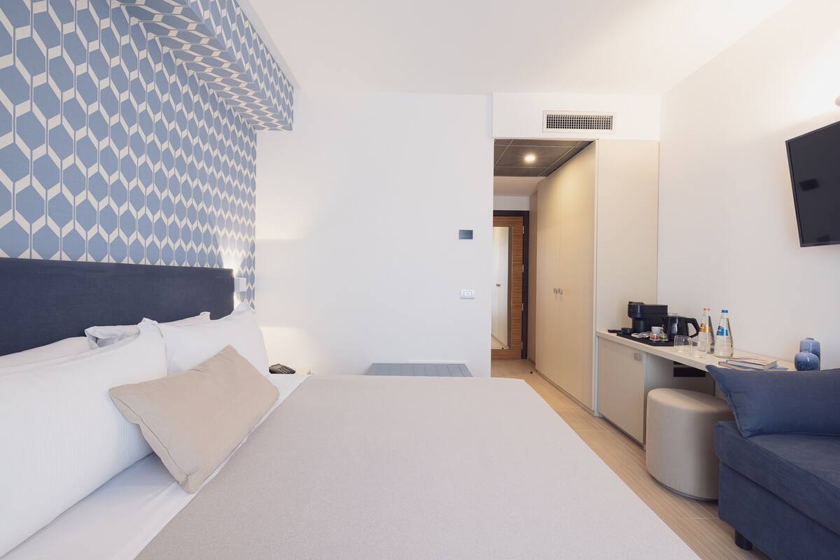 Tweepersoonskamer | Een kluis op de kamer, babybedden, gratis wifi, beddengoed