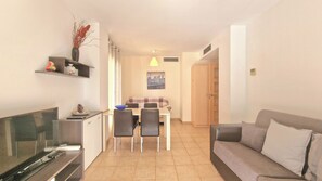 Apartment, 1 Bedroom, Balcony, Garden View | Living area