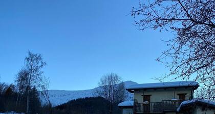 Baita Pinot – Cozy Alpine Chalet with Stunning Valley Views