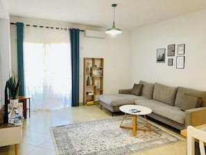 Appartement, 1 chambre, balcon, vue ville | Salle de séjour