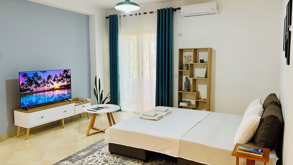 Departamento, 1 habitación, balcón, vista a la ciudad | Sala de estar