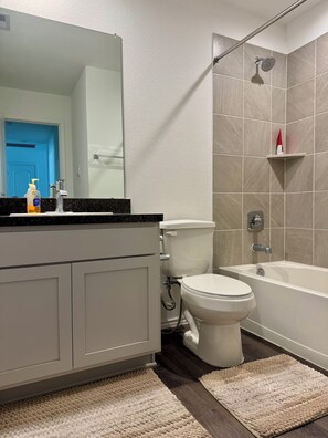 Bidet, towels, toilet paper - Cozy 3BR Home Near IAH Airport  - Gym & WiFi (Spring)