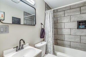 Hair dryer, towels, soap, toilet paper - Delano Dazzler 1 Bedroom Single Family Home (Wichita)