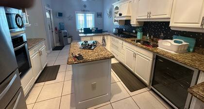 3-bedroom family housewith a large garden to relax under the Mango Tree