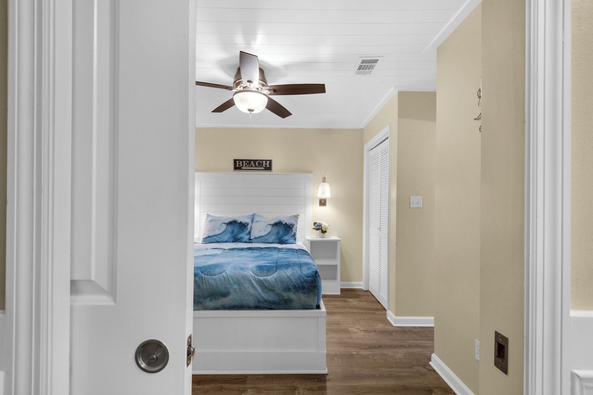 Master with pocket door for privacy.