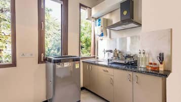 Fridge, microwave, stovetop, coffee/tea maker