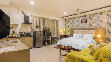 1 bedroom, desk, iron/ironing board, travel crib