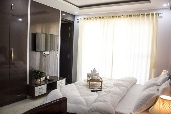 2 habitaciones, tabla de planchar con plancha, cuna de viaje y wifi 