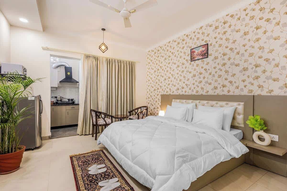 1 bedroom, desk, iron/ironing board, travel crib