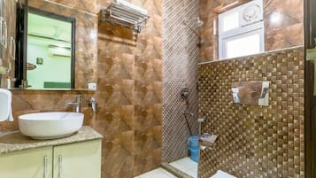 Shower, hair dryer, towels, shampoo