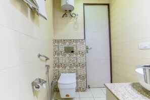 Shower, hair dryer, towels, shampoo