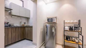 Fridge, microwave, stovetop, coffee/tea maker