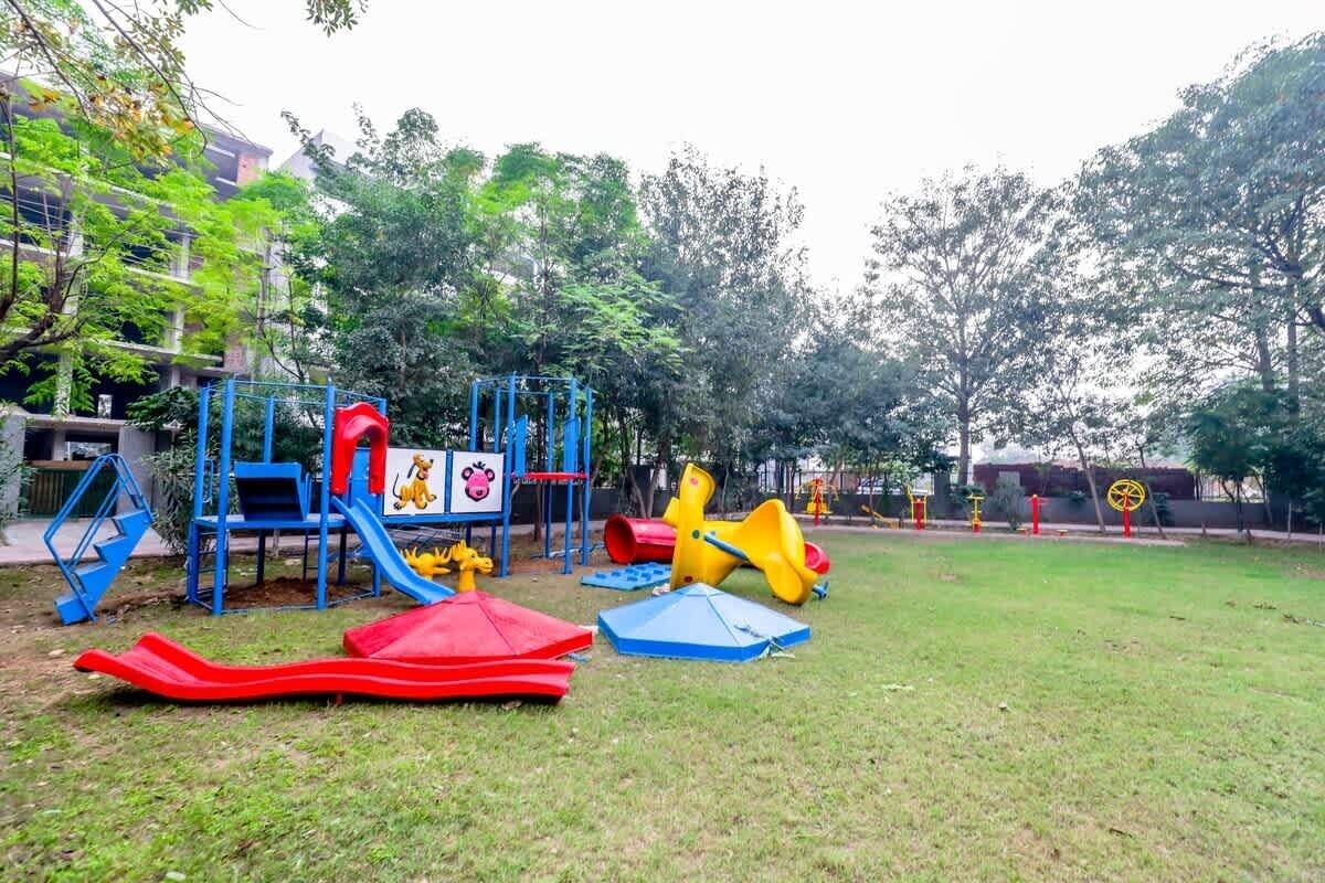 A playground with slides and climbing structures.