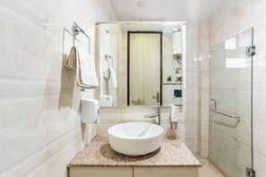 Shower, hair dryer, towels