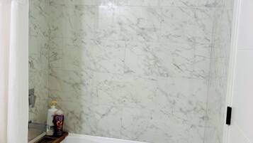 Hair dryer, towels, soap, shampoo