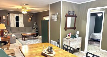 White River Lodge. 1 mile to White River and five miles north of Hurricane WMA