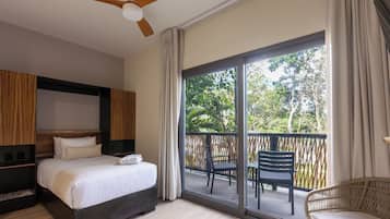 Economy eenpersoonskamer, uitzicht op tuin | Luxe beddengoed, donsdekens, een kluis op de kamer, een laptopwerkplek