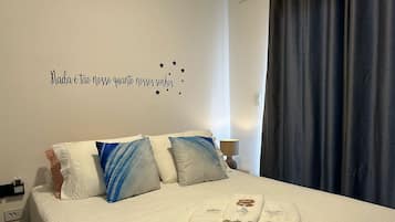 1 bedroom, desk, iron/ironing board, travel crib