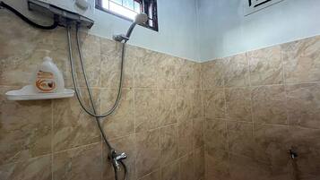 Villa | Bathroom | Shower, rainfall showerhead, free toiletries, towels