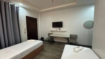 Desk, free WiFi, bed sheets
