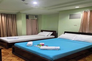 Standard Triple Room | Desk, iron/ironing board, free WiFi, bed sheets - Voyagers Palace (Puerto Princesa)