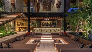 Deluxe Villa, Pool View | Living room | Flat-screen TV
