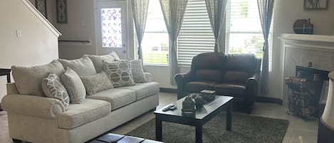 Smart TV, fireplace, DVD player, books