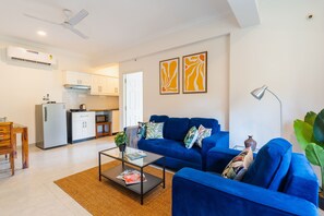 Deluxe Apartment | Living area - Mona Collective at Serenova (Calangute)