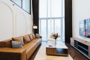 Superior Apartment, 2 Bedrooms, Kitchen, City View | Living area | 42-inch Smart TV with cable channels - PentStudio West Lake by Emily in Town (Hanoi)