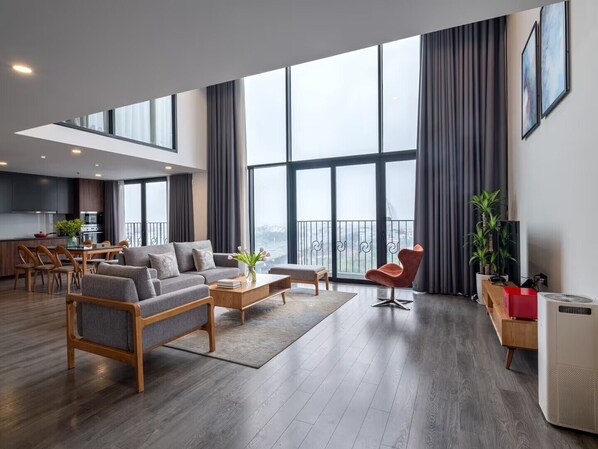 Appartement Supérieur, 2 chambres, cuisine, vue ville | Coin séjour