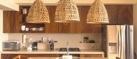Fridge, microwave, stovetop, coffee/tea maker